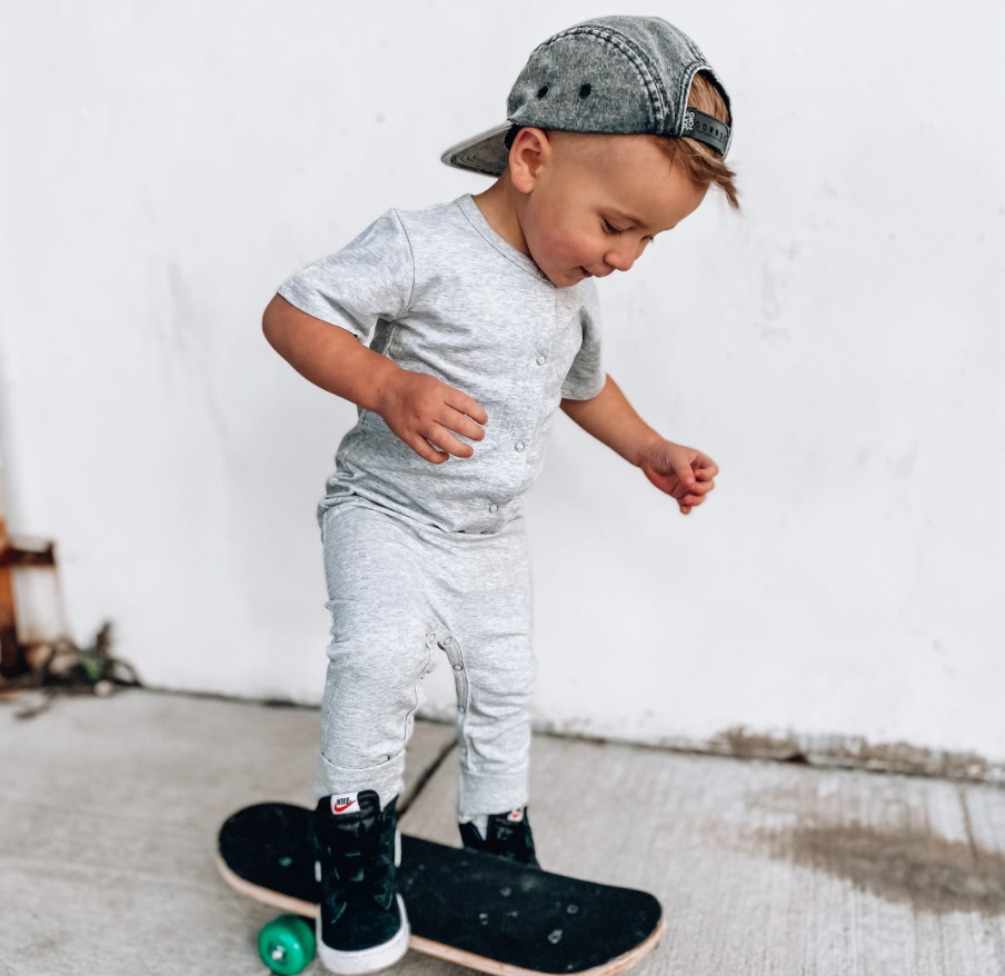 toddler in trendy grey onesie
