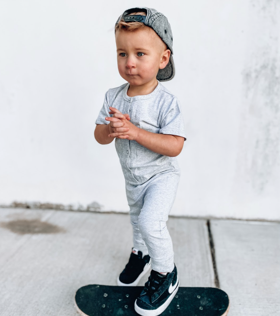 toddler in grey onesie