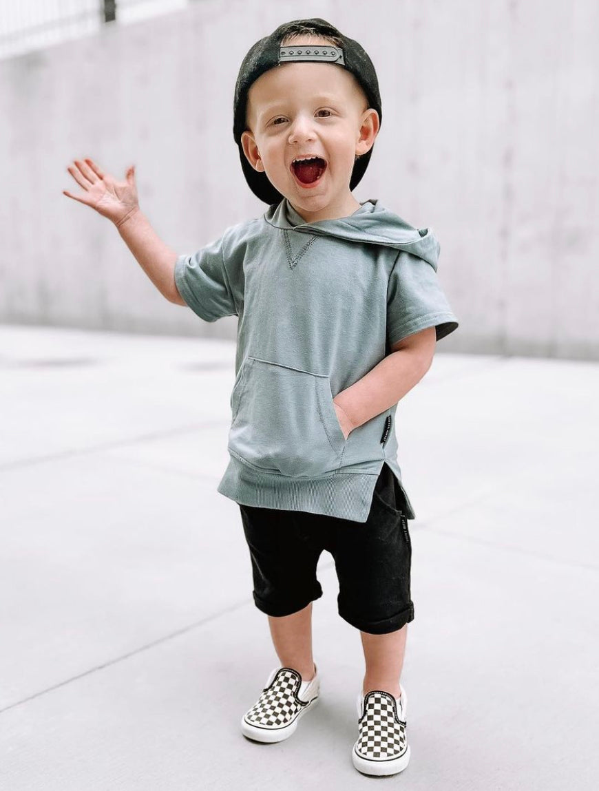 toddler in toddler trendy outfit with kids short sleeve hoodie and kids harem shorts