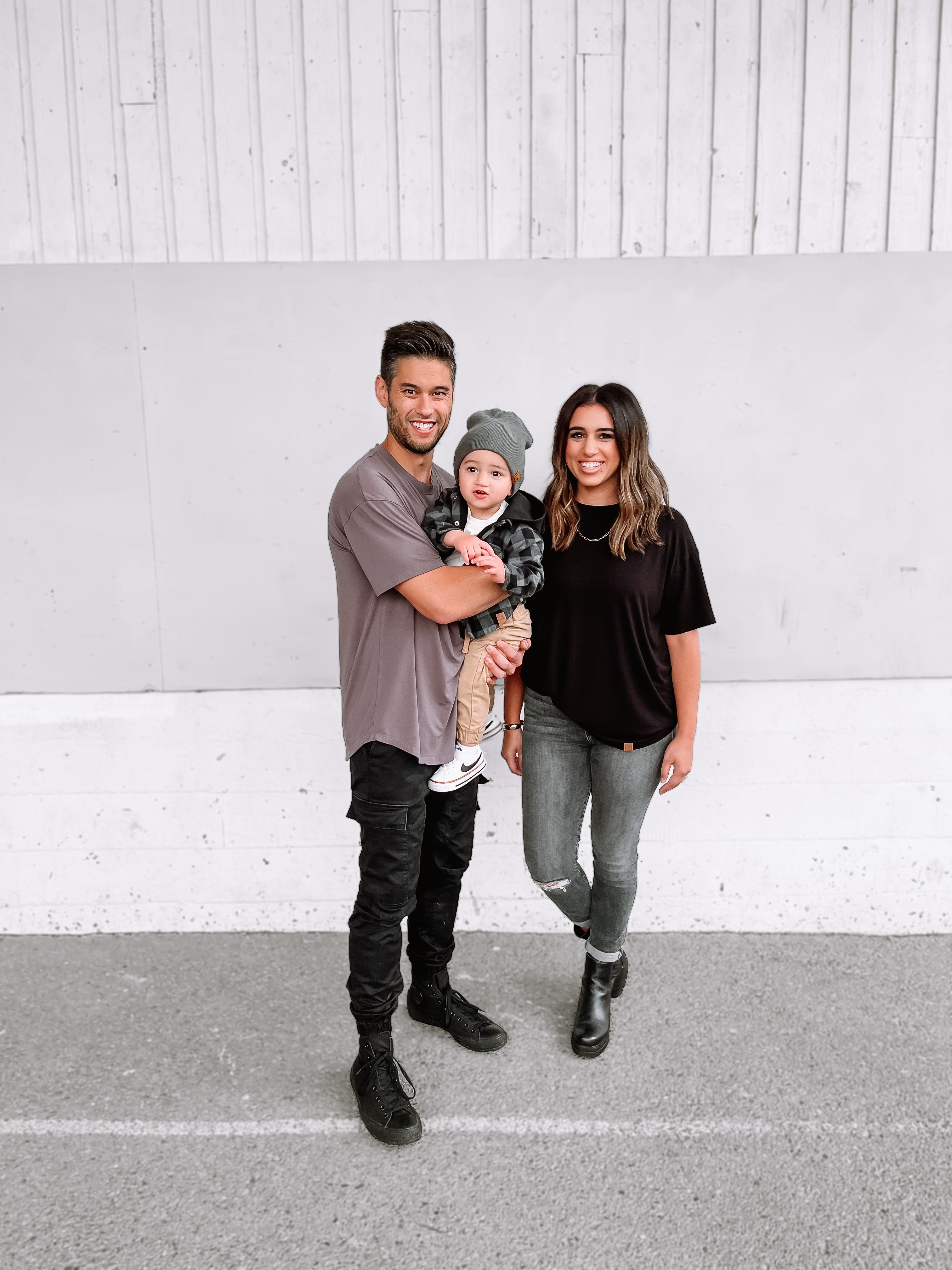 Family in oversized shirts.