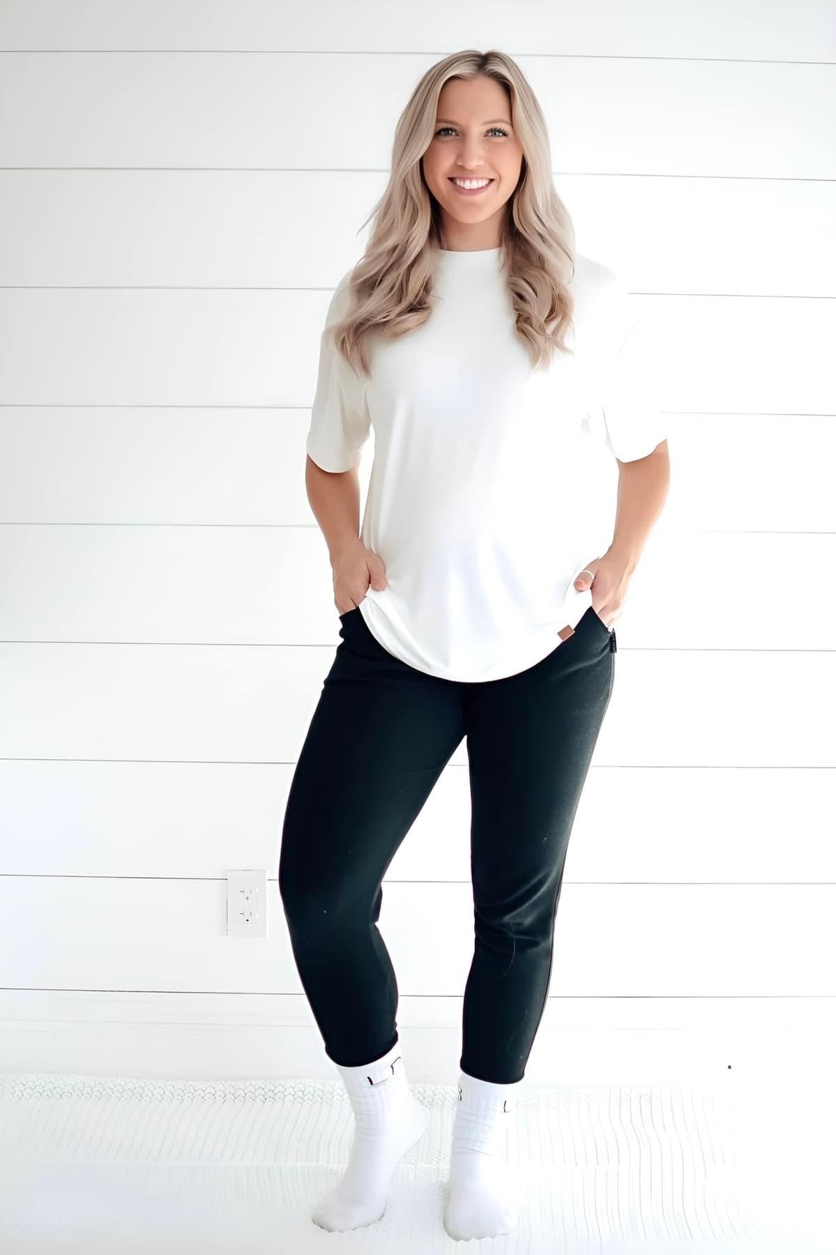 Woman in oversized, white bamboo tee